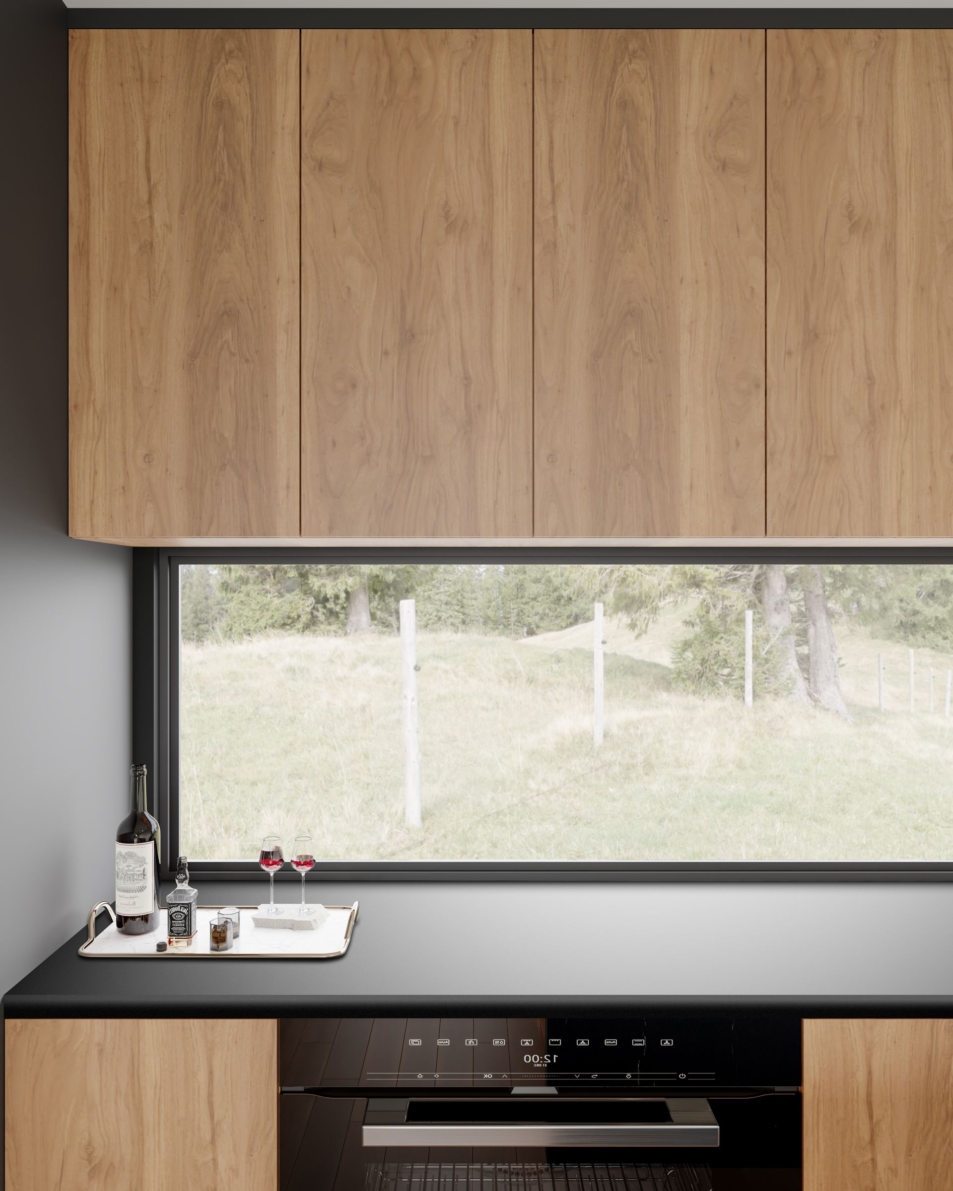 Close up of kitchen with oak cabinetry and large waterfall island featuring Astro Black leathered finish stone benchtop.