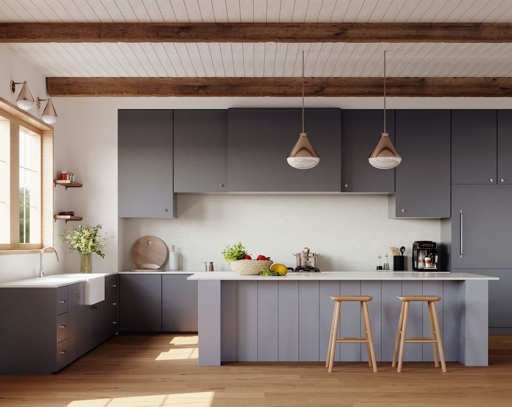 A Kitchen With Gray Cabinets and Wooden Floors — Better Stone in Caloundra West, QLD