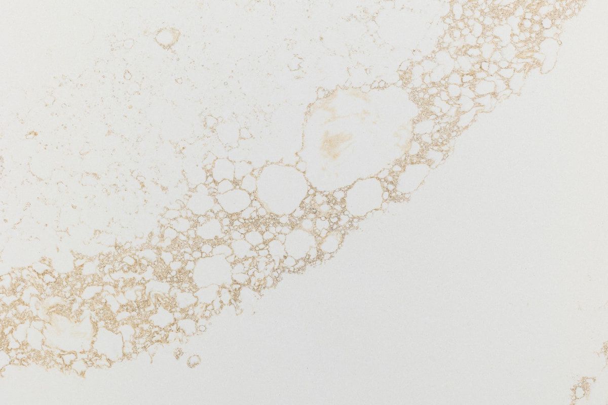 A Close Up of a White Marble Counter Top With a Gold Border — Better Stone in Caloundra West, QLD