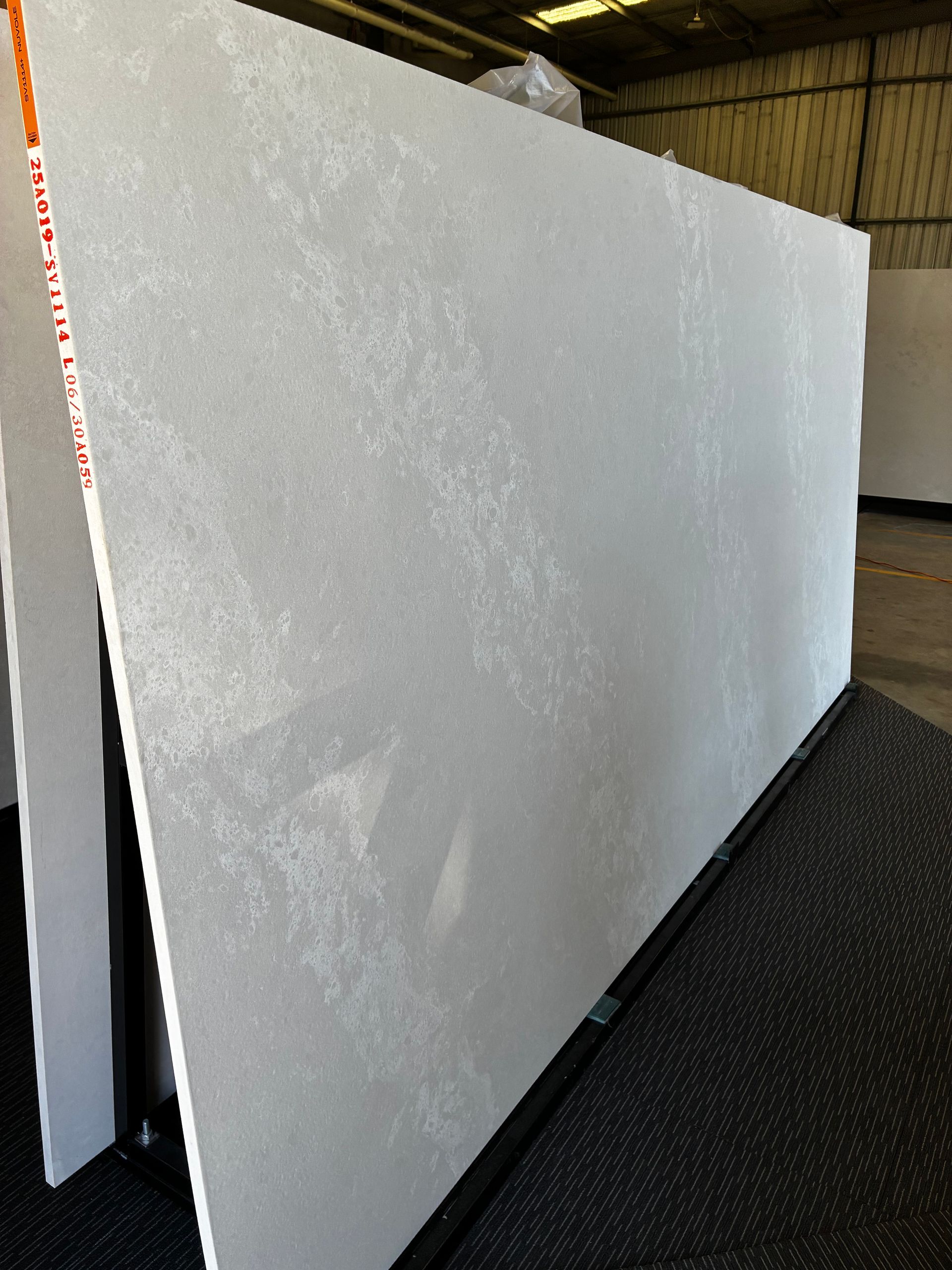 A sheet of stone in colour Nuvole placed vertically — Better Stone in Caloundra West, QLD 