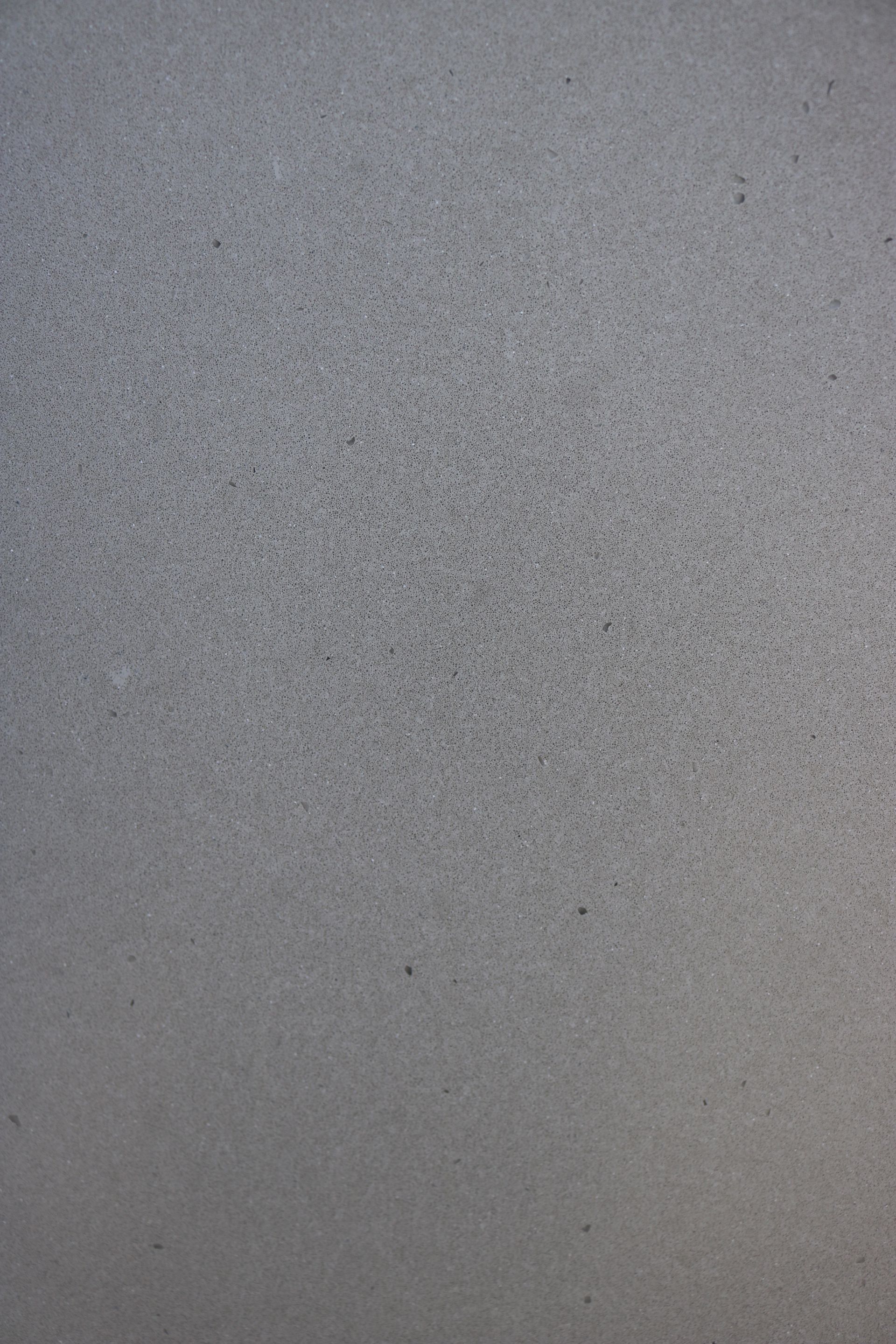 Foam covering a surface, gradients of white and grey.