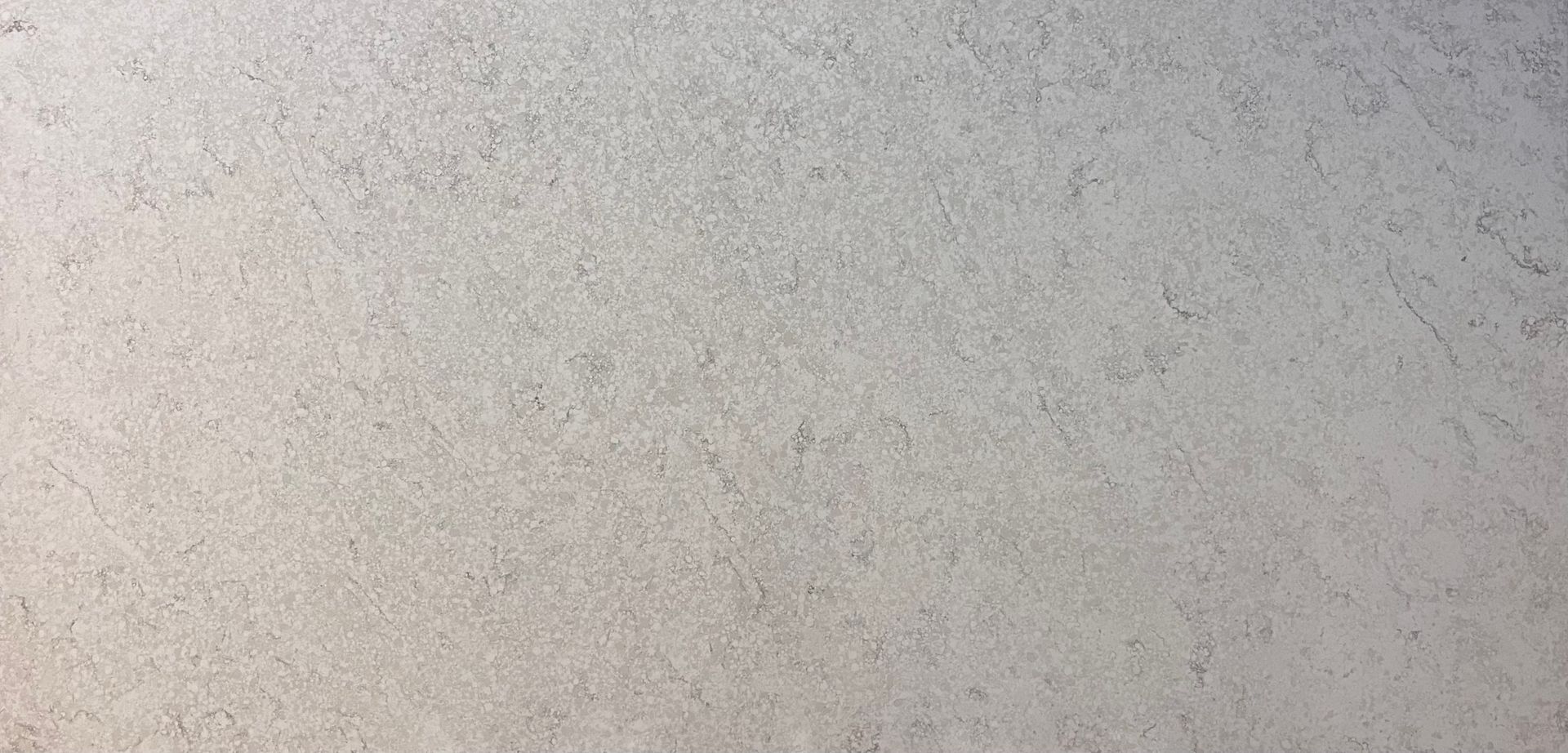Light gray, textured surface.