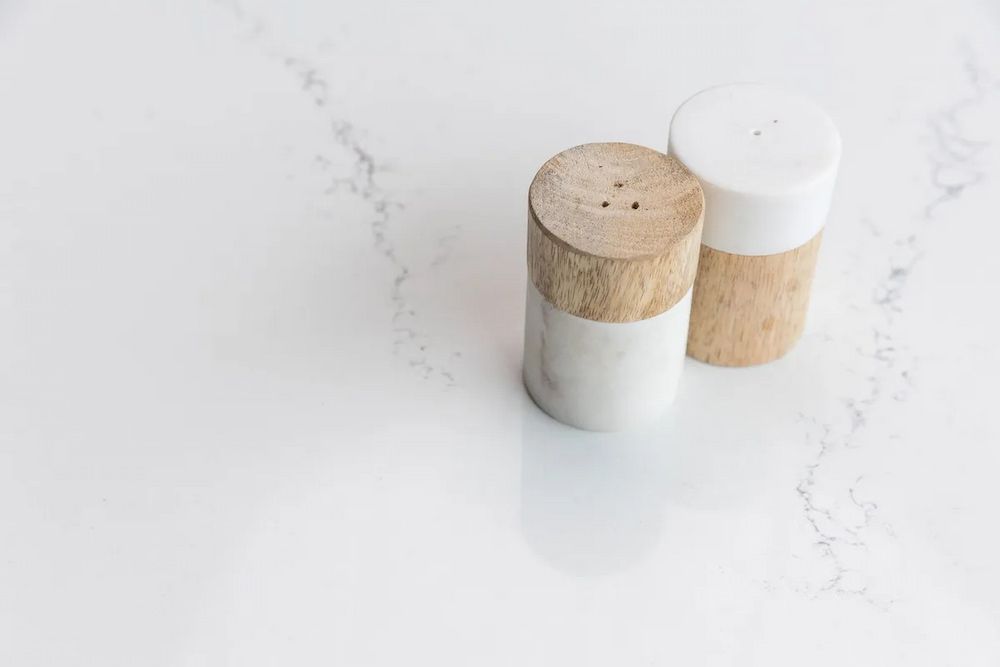 A Bunch of Flowers Are Sitting on a White Surface — Better Stone in Caloundra West, QLD