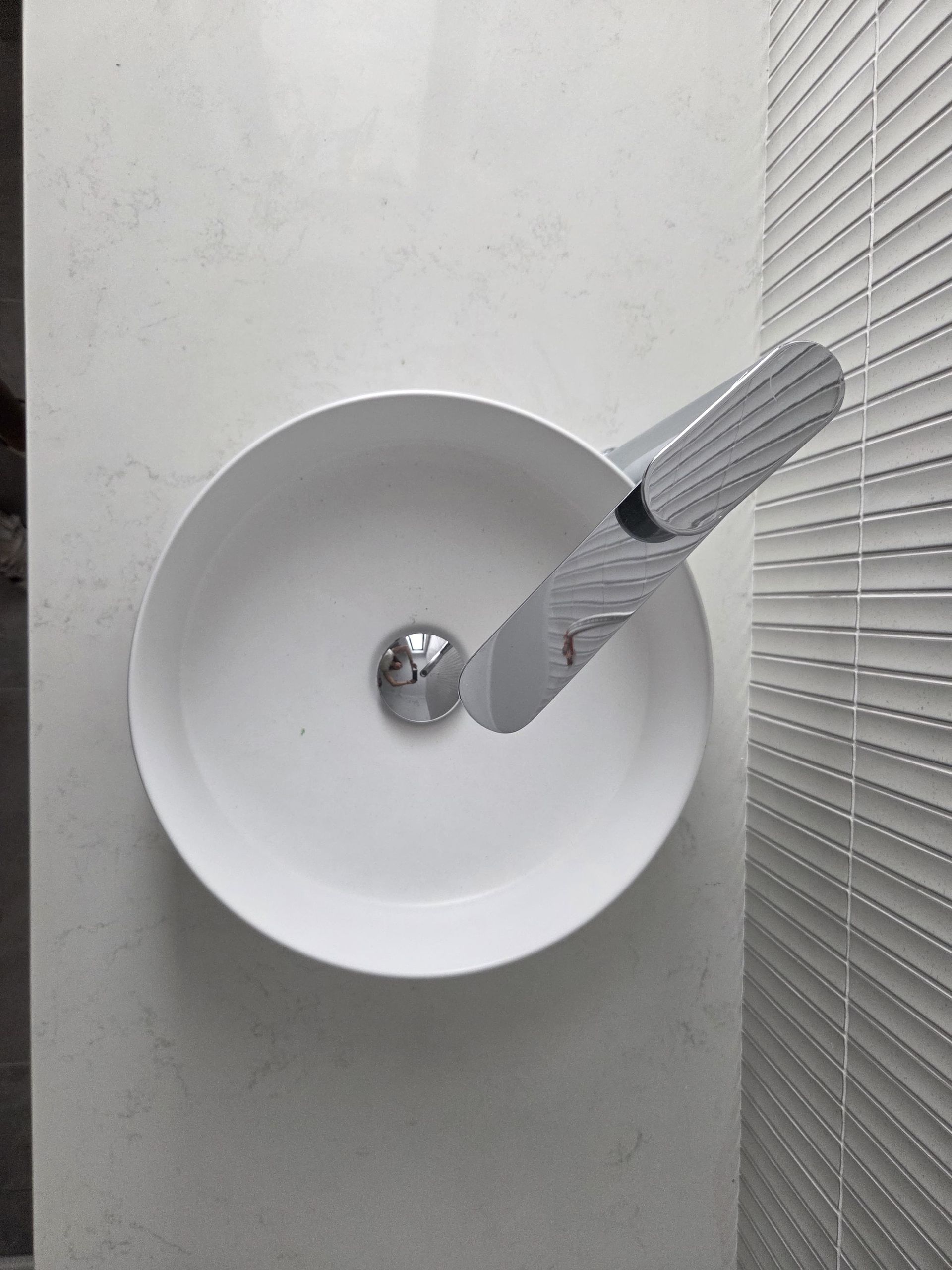 Top-down View of a Modern White Vessel Sink With a Chrome Faucet — Better Stone in Caloundra West, QLD
