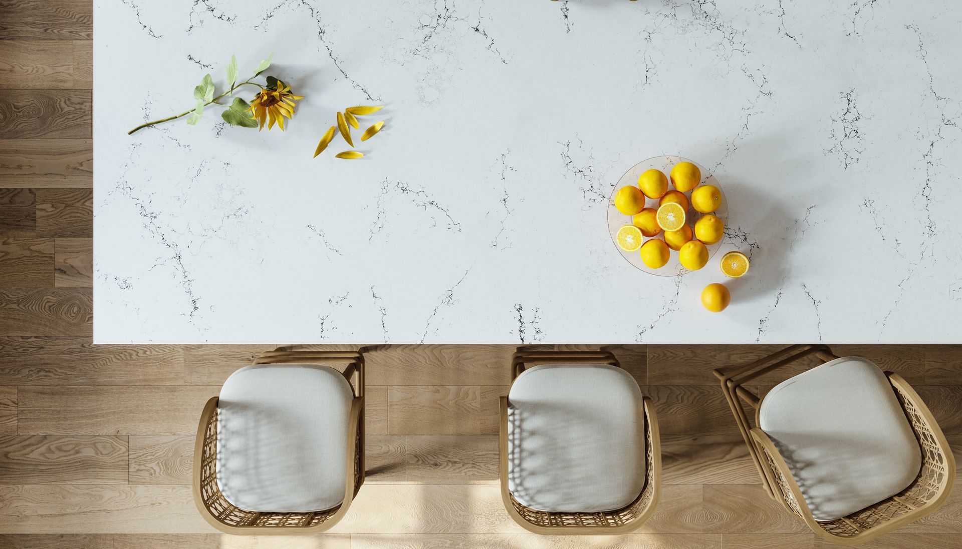 A White Marble Counter Top With a Bowl of Lemons on It — Better Stone in Caloundra West, QLD
