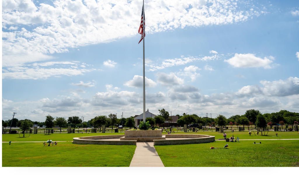 New Hope Memorial Gardens photo with the American flag in the center