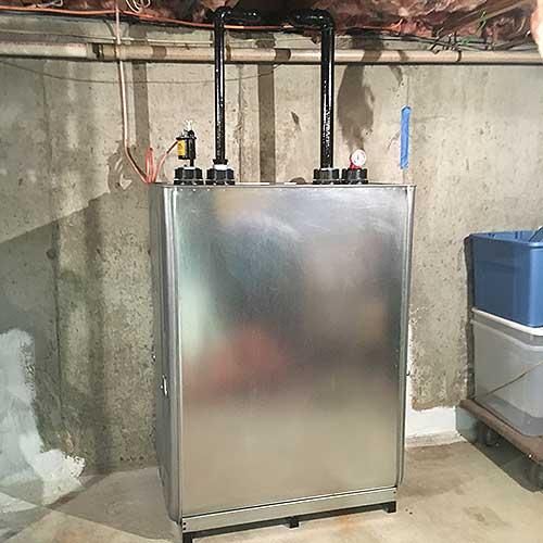 Residential heating oil tank installed in a basement