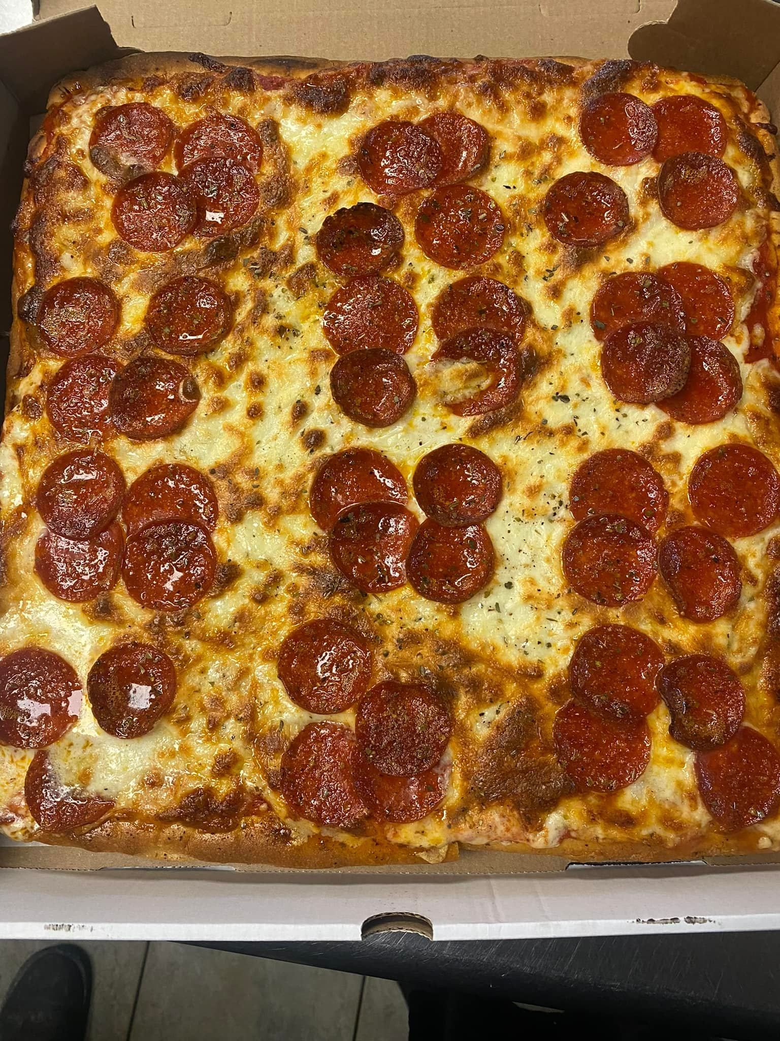 a pizza with pepperoni and cheese.