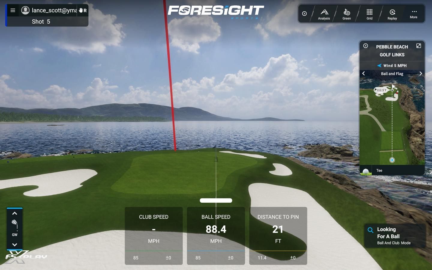 A computer screen shows a golf course with the word foresight on it