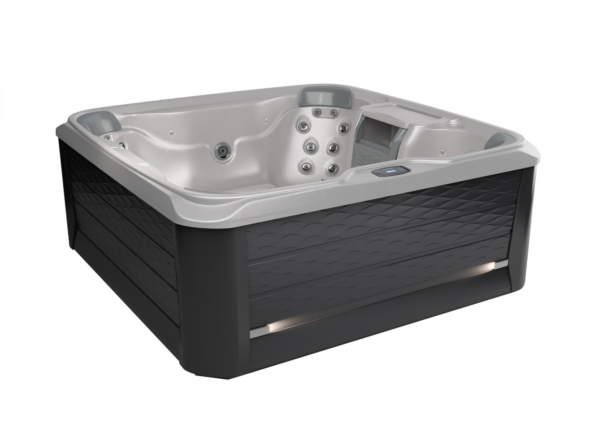 A white and black hot tub is sitting on a white surface.