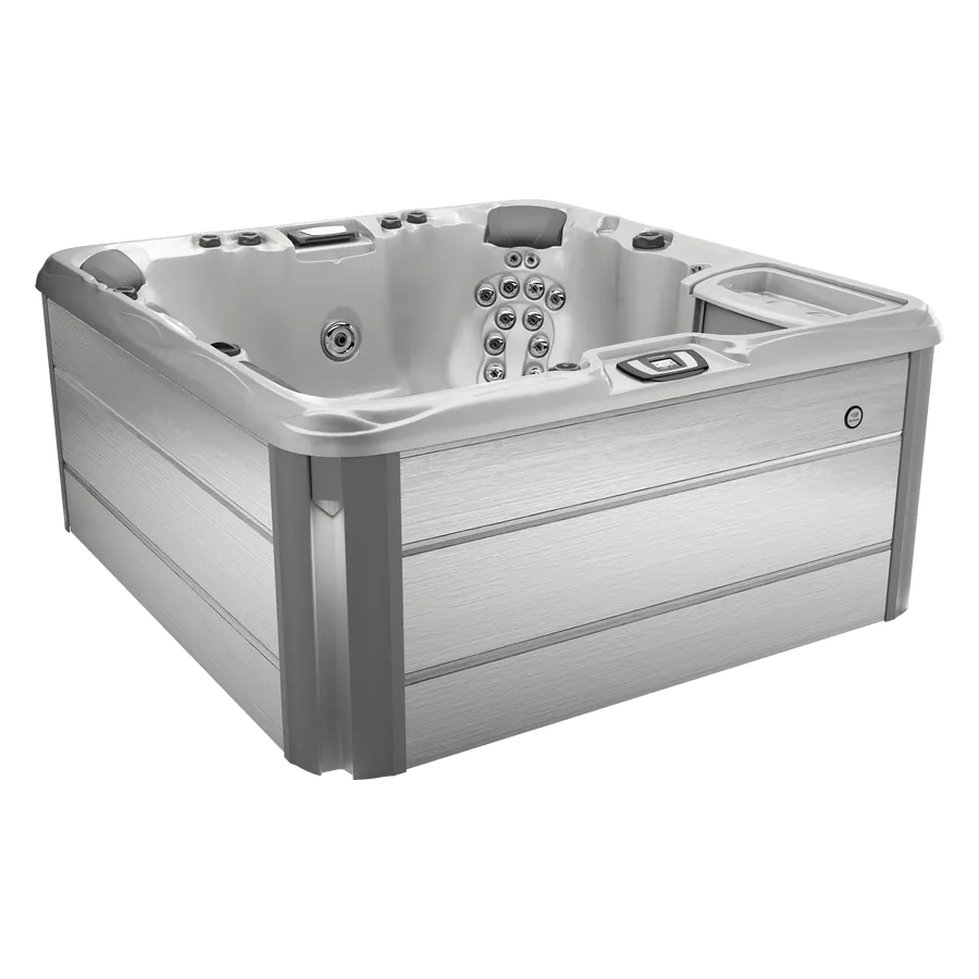 A square hot tub with a lot of jets on a white background.