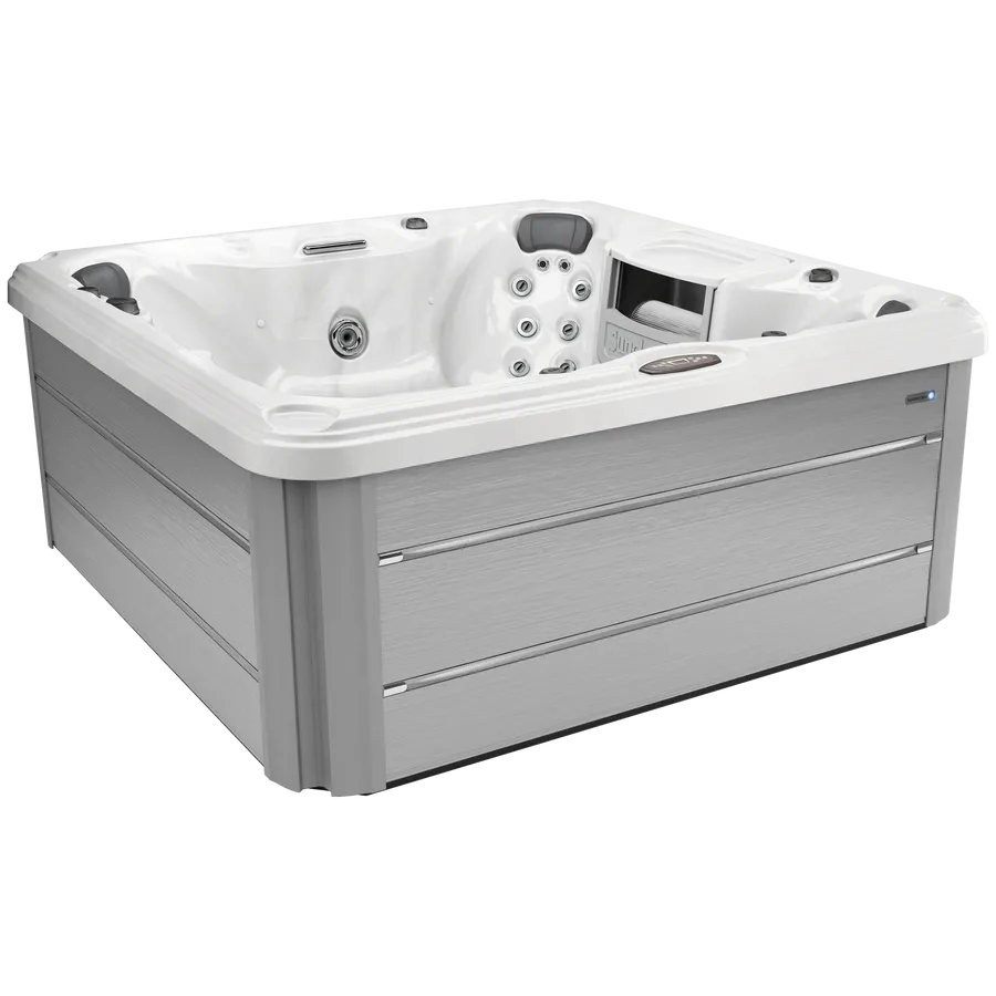 A white and gray hot tub is sitting on a white surface.