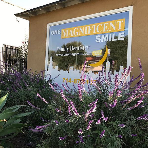 A sign for one magnificent smile family dentistry