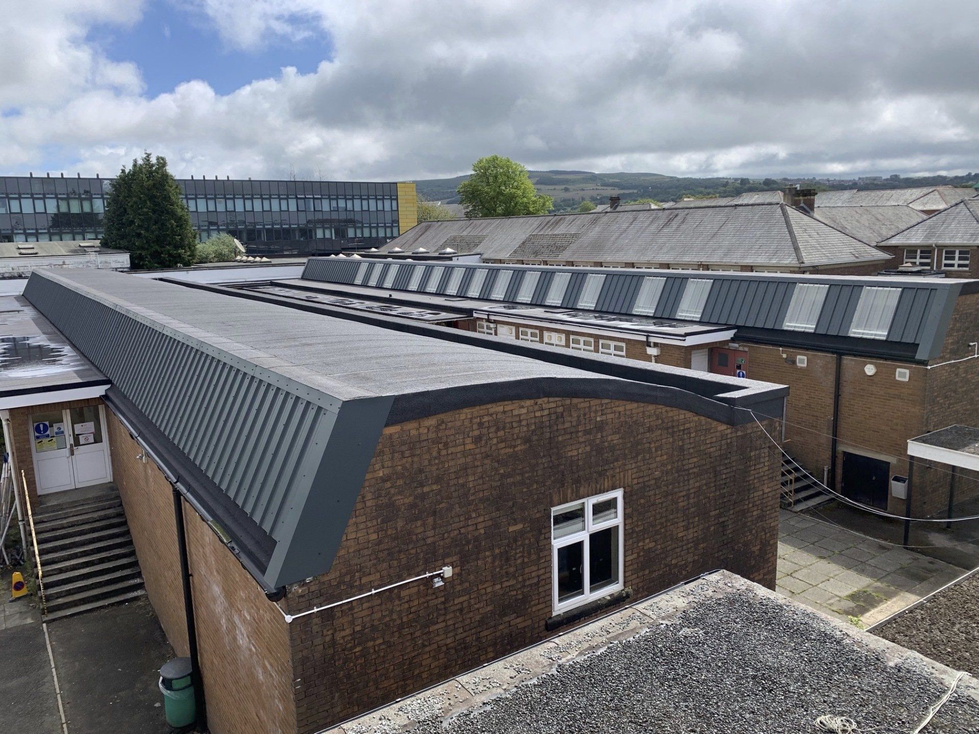 Building repair and refurbishment, maintenance, roofing works