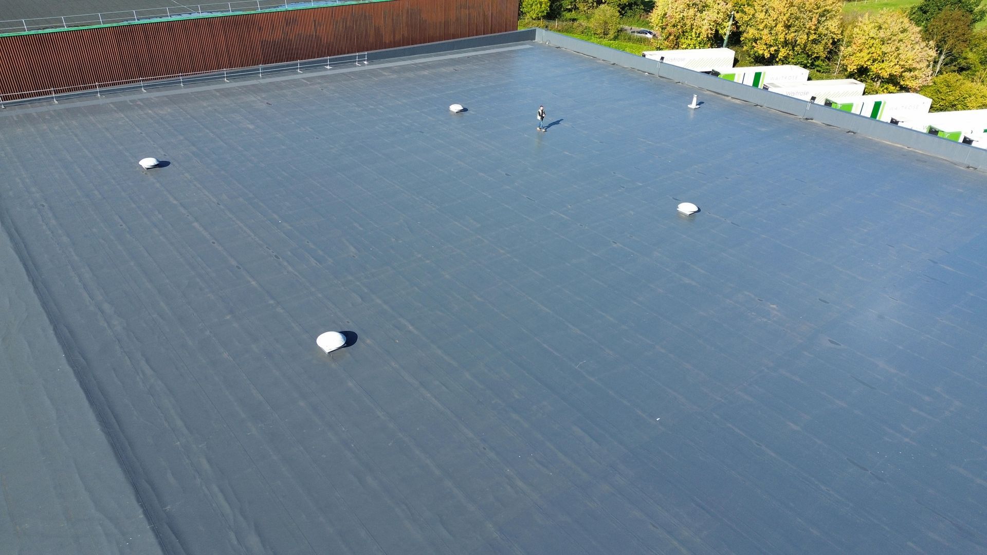 Large scale commercial roofing project, storm damaged