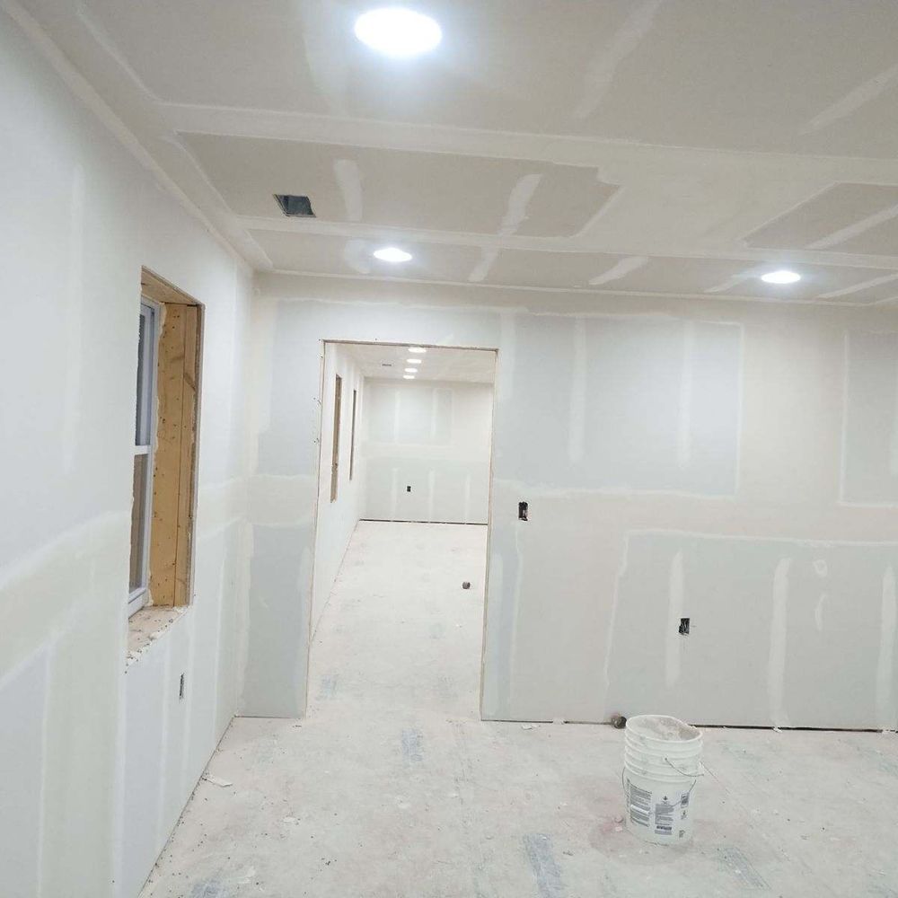 New drywall repair and installation project in New York showing professionally hung drywall panels, 