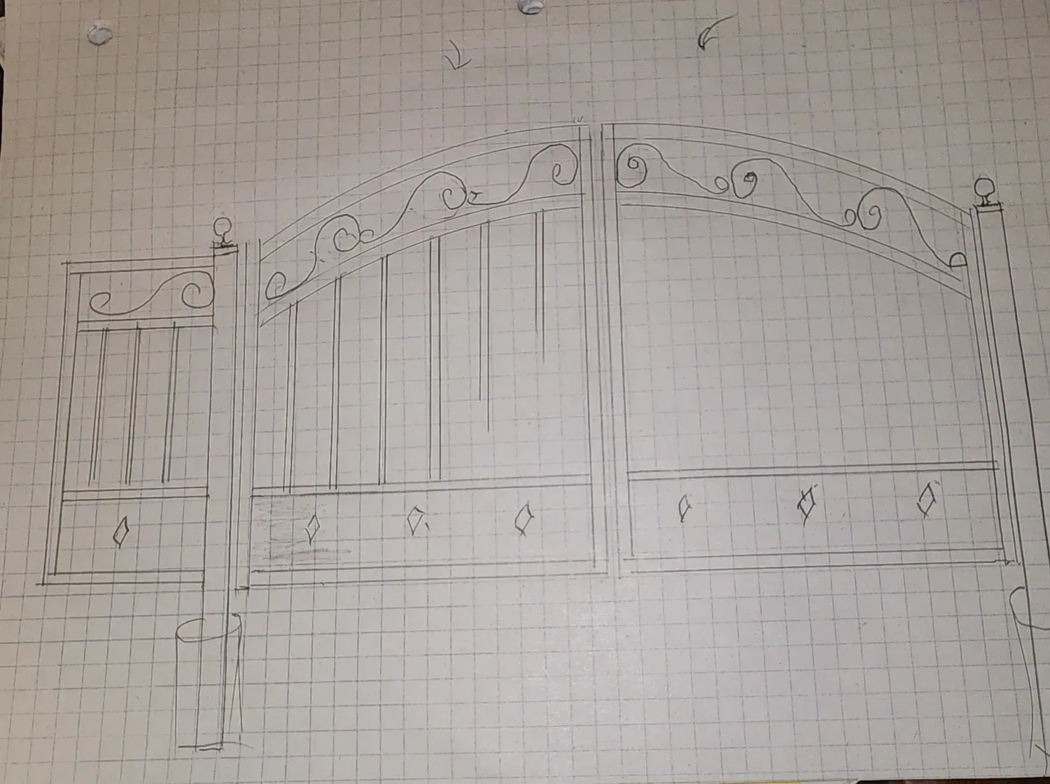 Pencil sketch of an arched gate with decorative columns and fence on graph paper