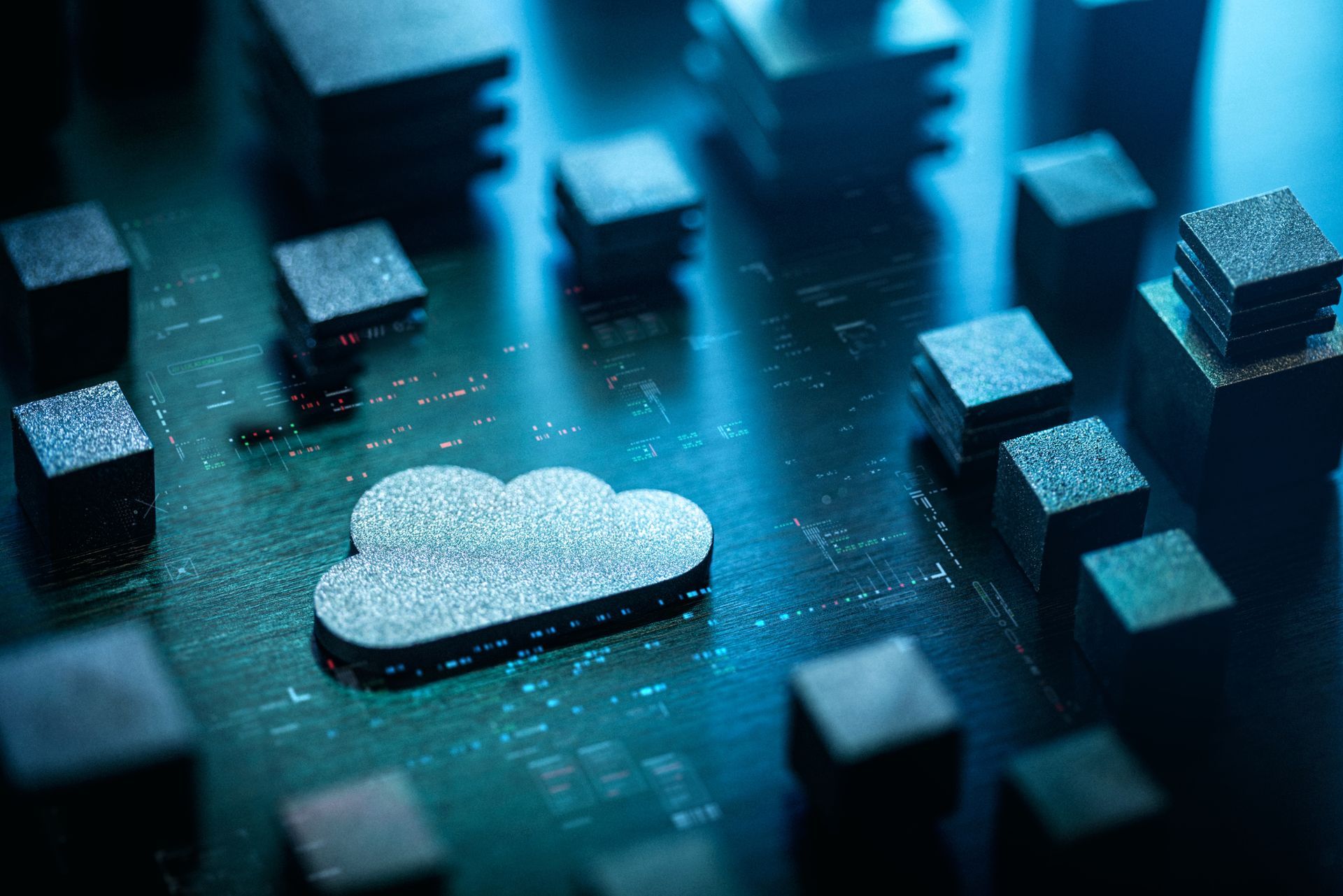 A cloud icon on a circuit board surrounded by electronic components in a close-up A cloud icon on a circuit board surrounded by electronic components in a close-up