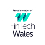FinTech Wales logo with teal and navy text, “Proud member of” above a stylized W mark.