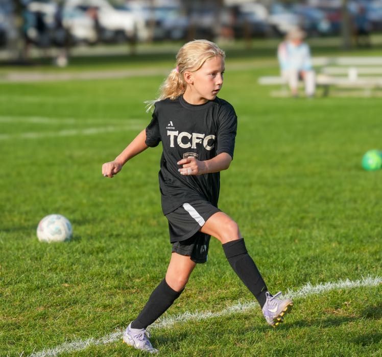 Team Challenger FC Junior Academy player on the field