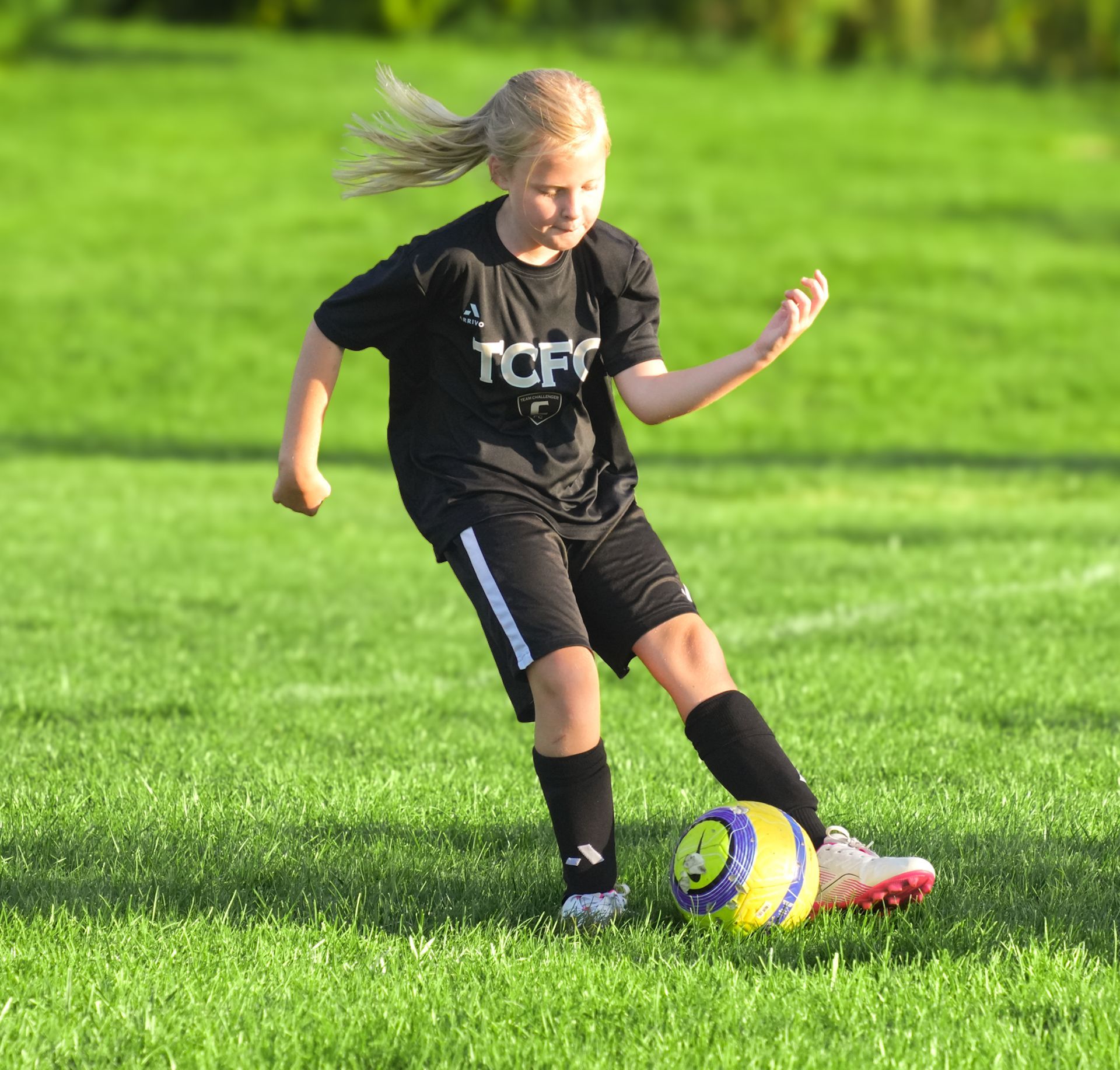 Team Challenger FC Junior Academy player on the field