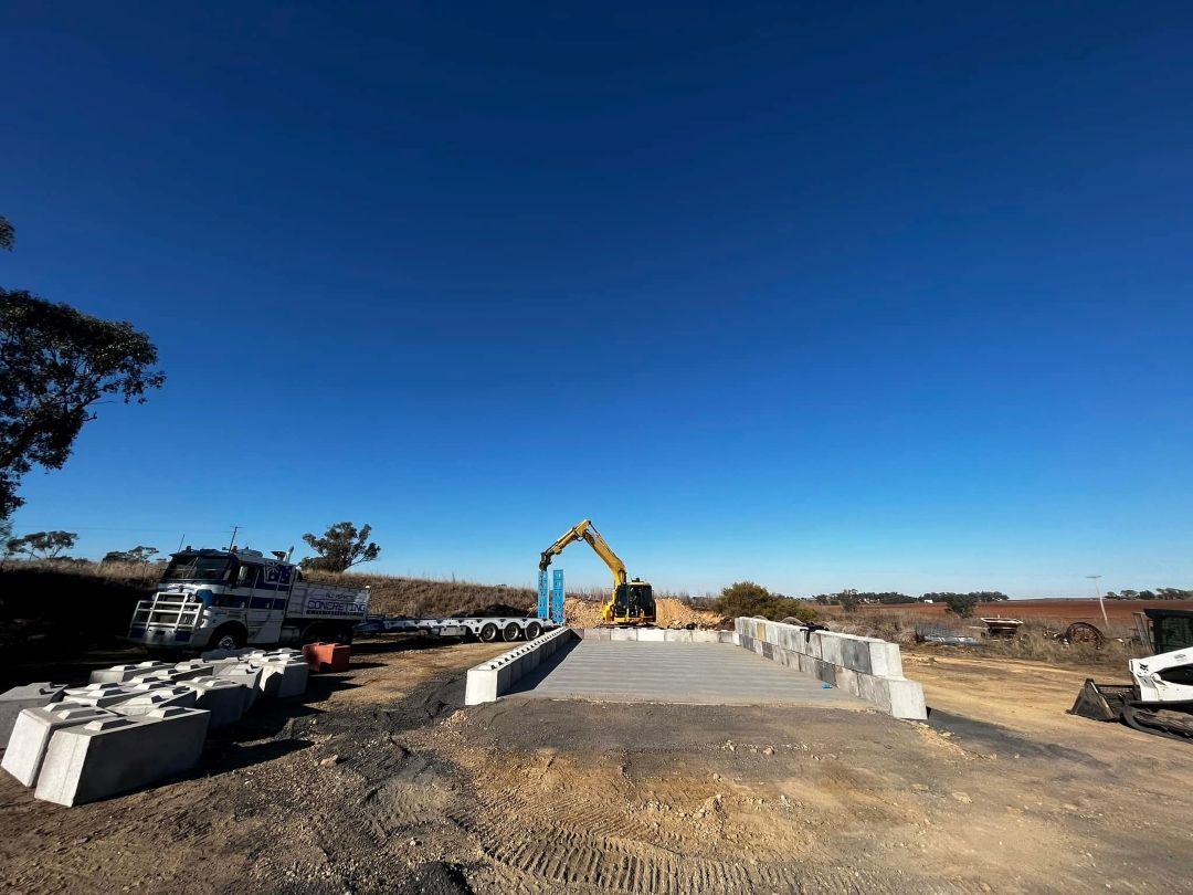 Construction Site With a Truck and a Bulldozer in the Background — All Aspects Concreting & Earthworks Pty Ltd in Dubbo, NSW
