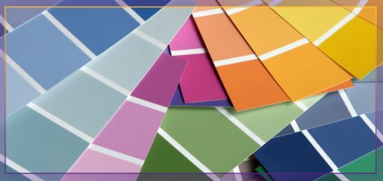Colorful abstract geometric shapes and overlapping translucent panels in blue, pink, orange, and green.