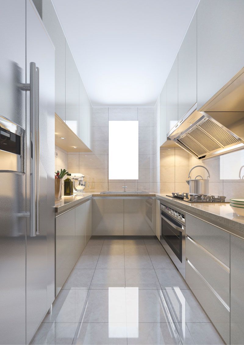 Bright modern galley kitchen with glossy white cabinets, stainless appliances, and tiled floor