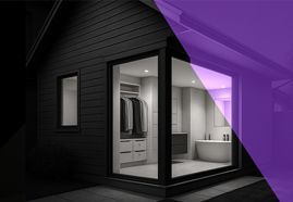 Modern black house interior seen through large windows, with a purple diagonal overlay.
