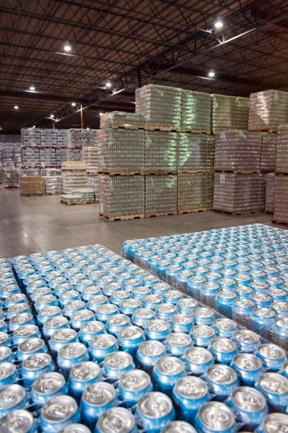 Warehouse storage with stacked pallets of packaged goods representing bonded, chilled, and ambient FMCG warehousing
