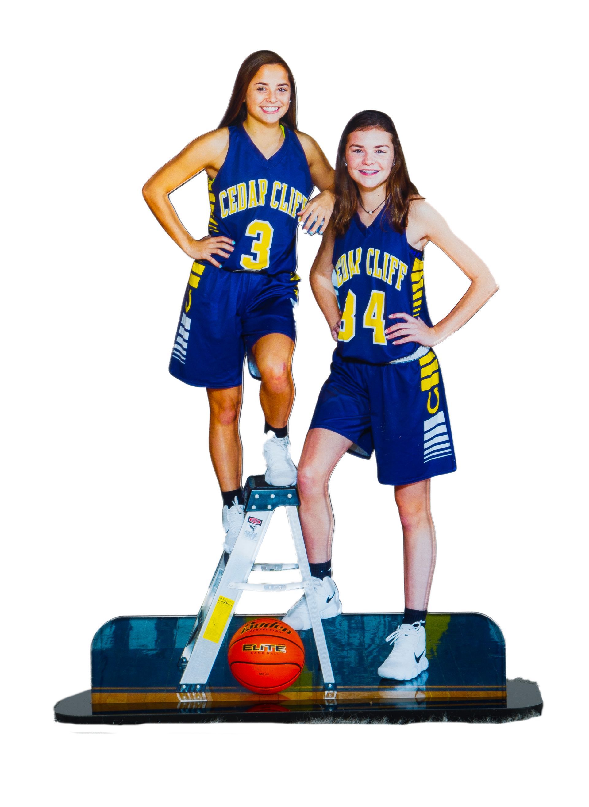 Two basketball player figurines in blue and yellow uniforms on a display base with a basketball