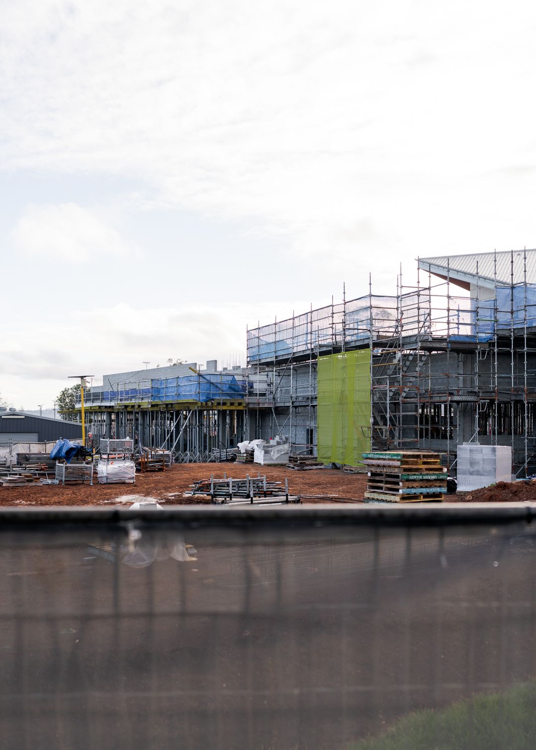 Scaffolding around a building under construction
