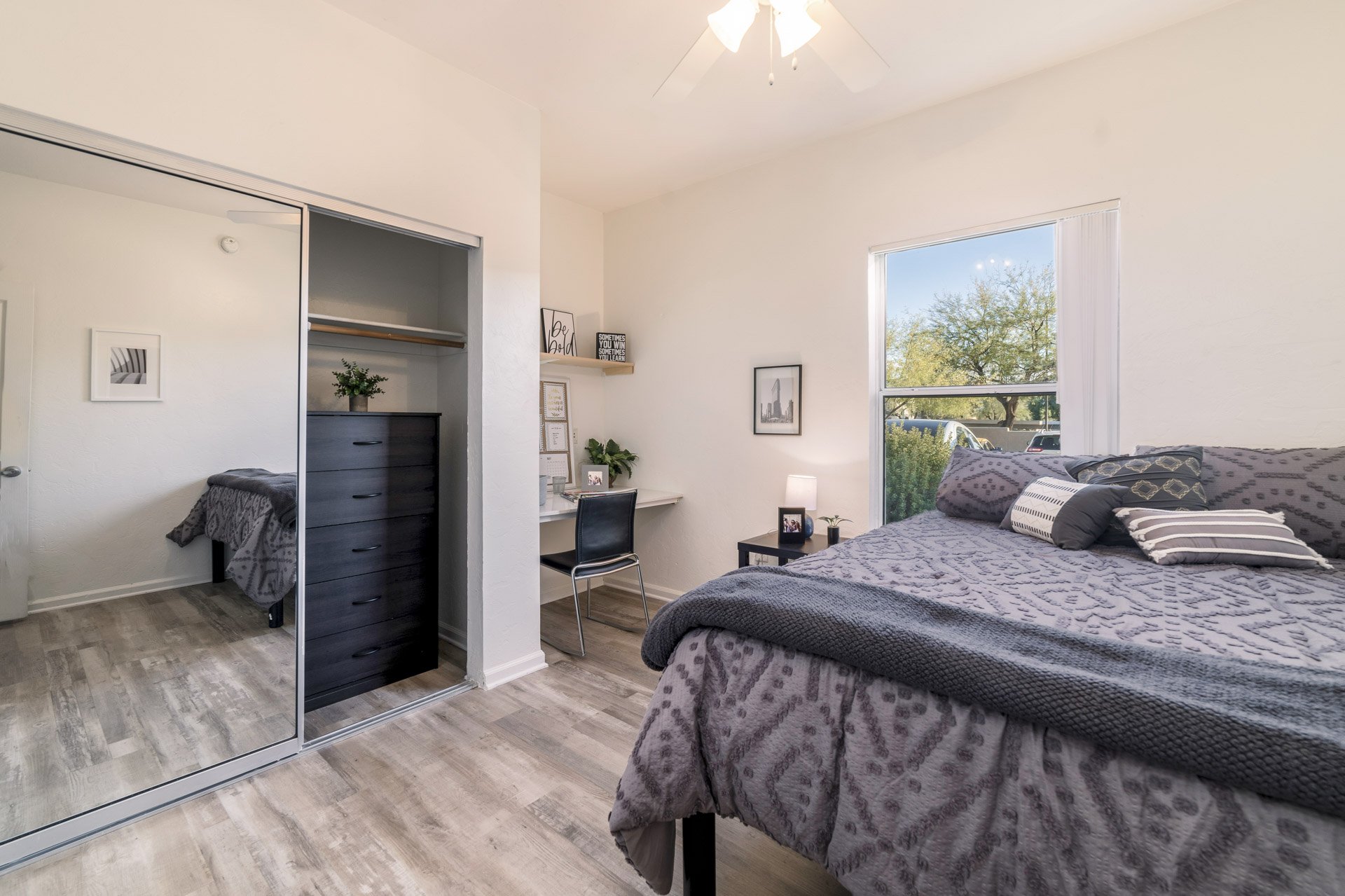 Bedroom. Furnishings and finishes may vary by apartment.