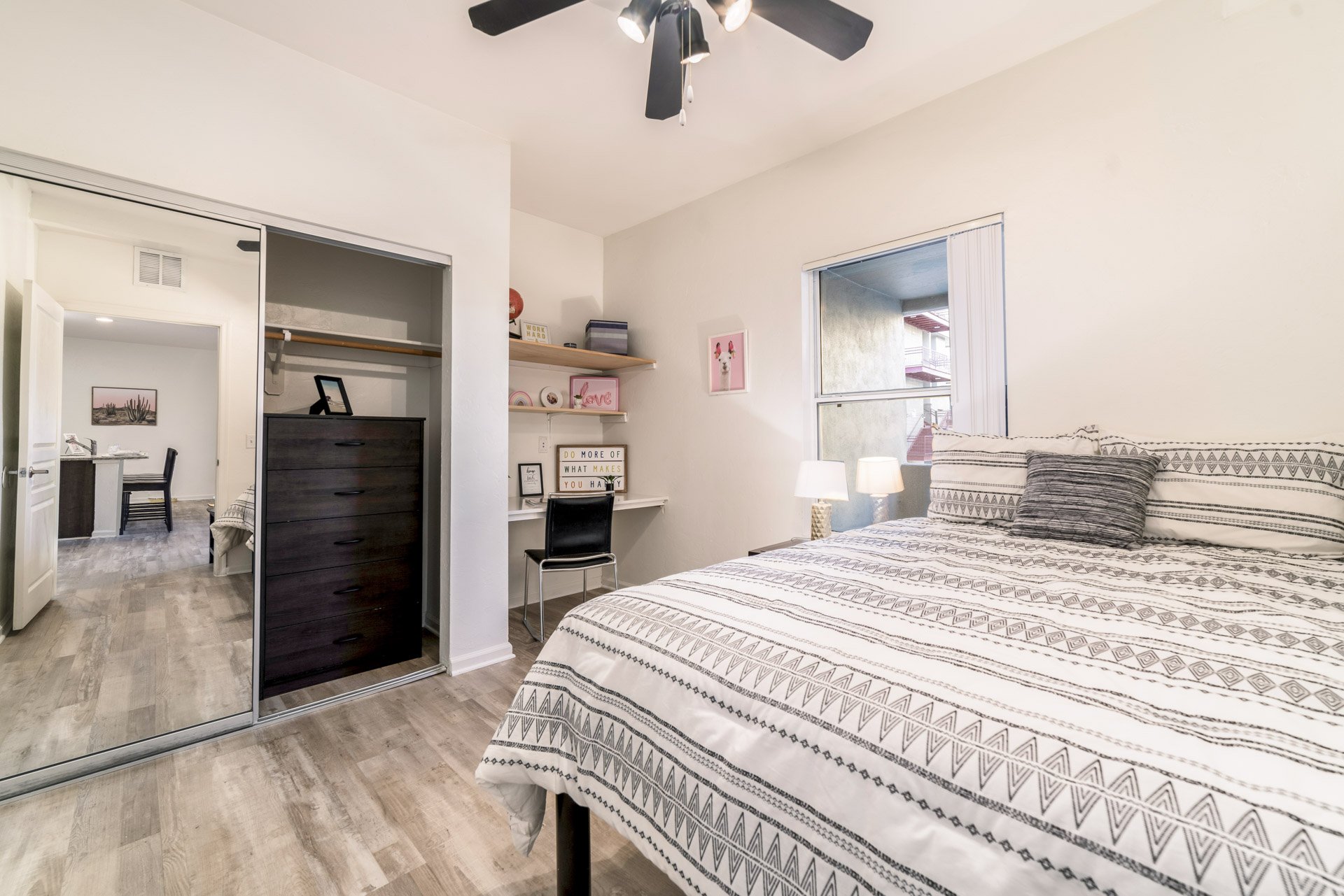 Bedroom. Furnishings and finishes may vary by apartment.