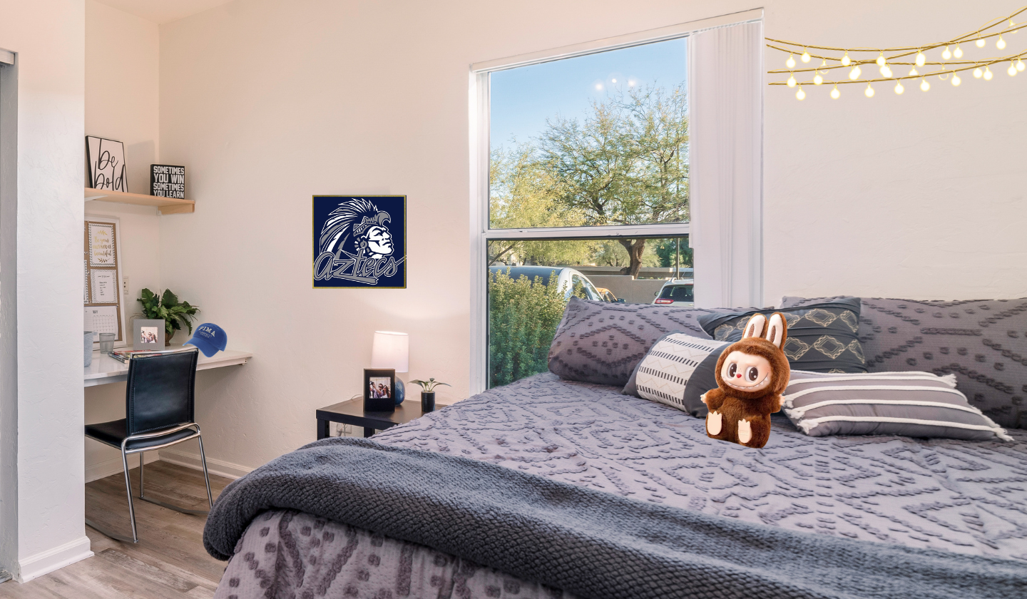 A decorated fully furnished private room with private study nook.