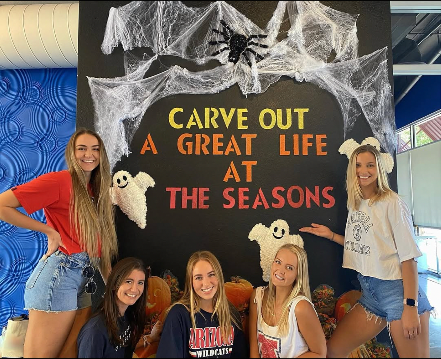 Female residents at the Seasons Halloween decorated Clubhouse.