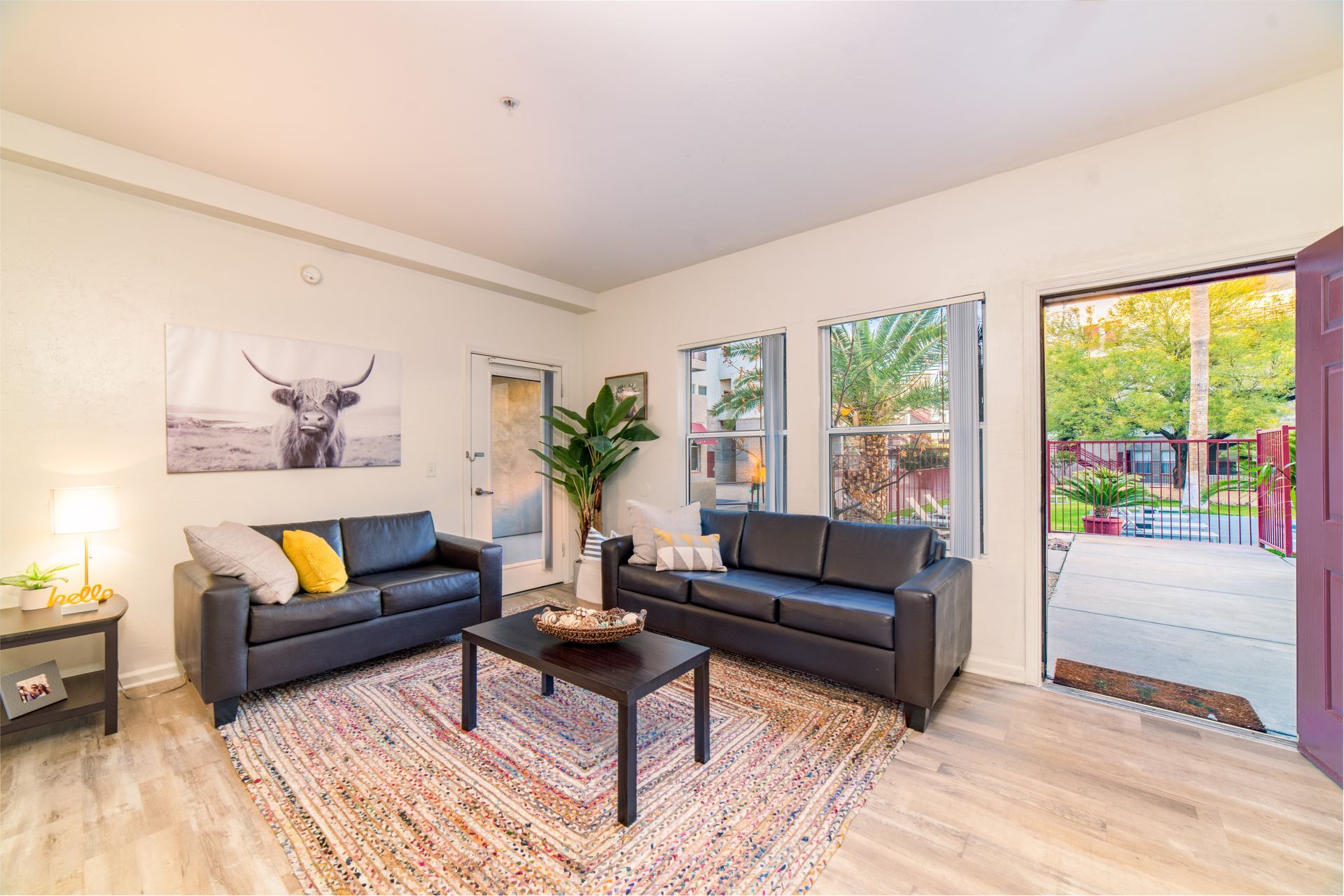 Living room. Furnishings and finishes may vary by apartment.