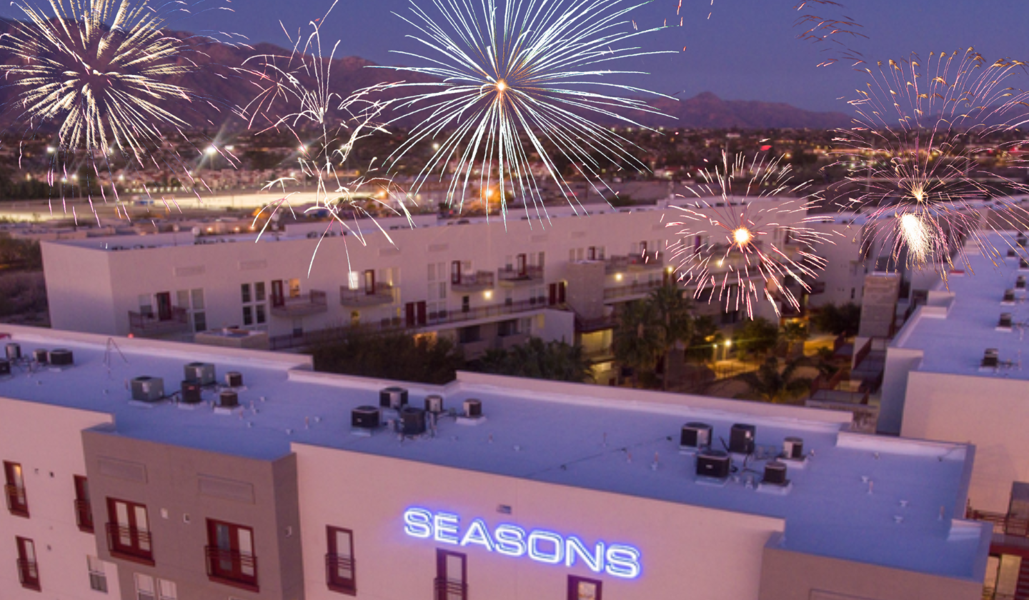 Fireworks above the Seasons apartment complex and Tucson mountain range. 