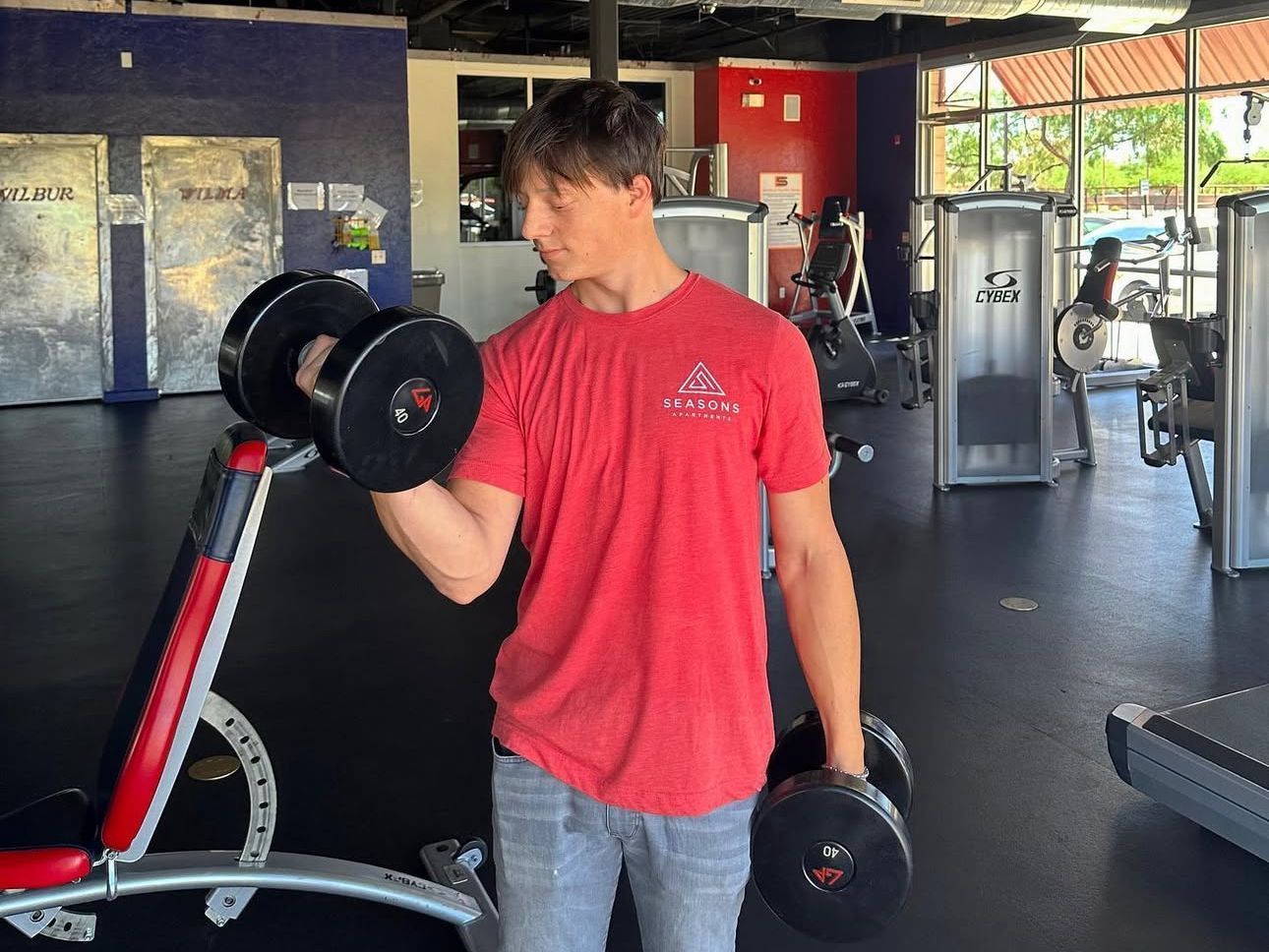 No membership needed to get fit at The Seasons! A male resident working out in the Seasons' on-site fitness center.