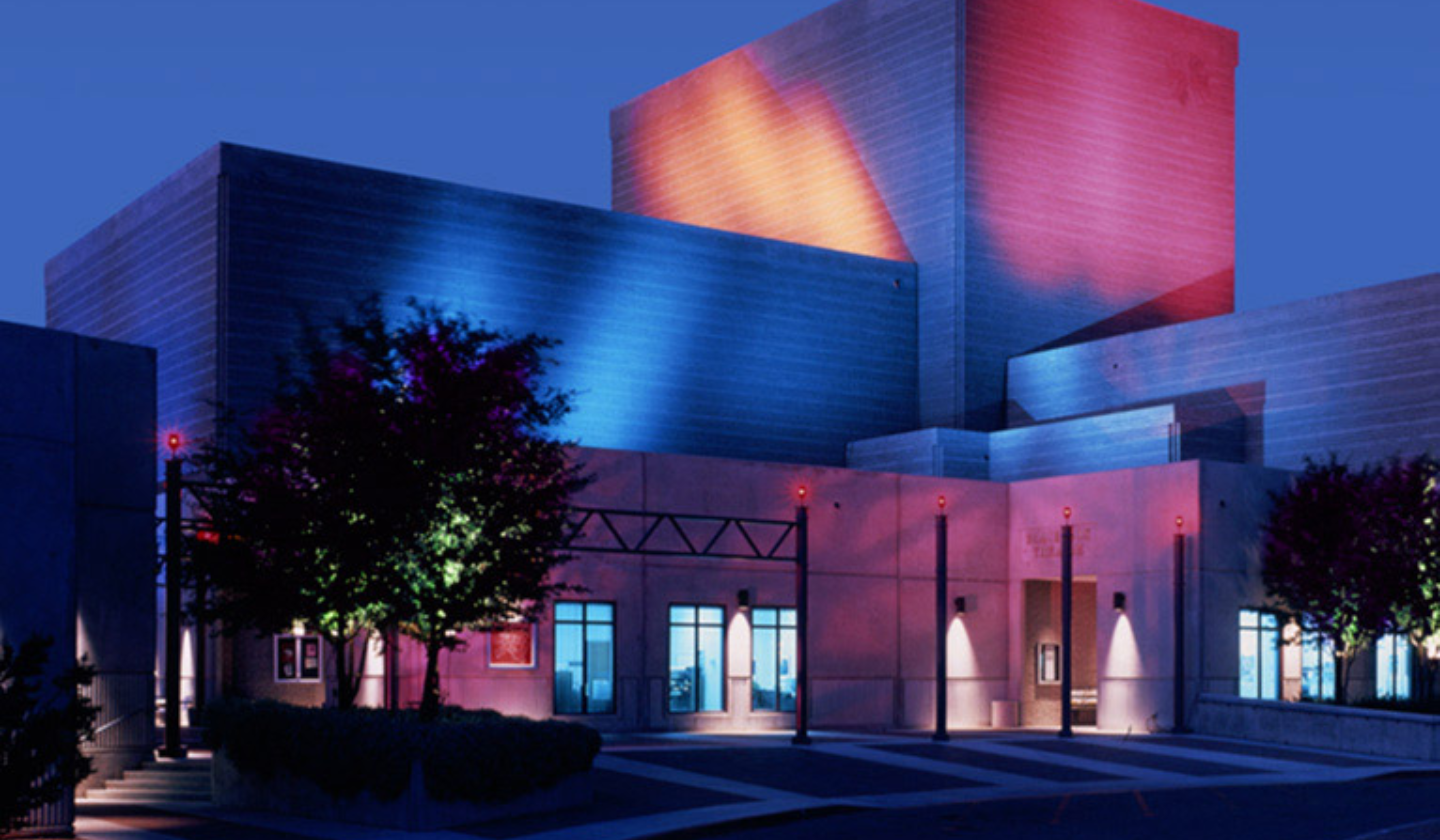 West Campus of PIma Community College lit up in the evening.