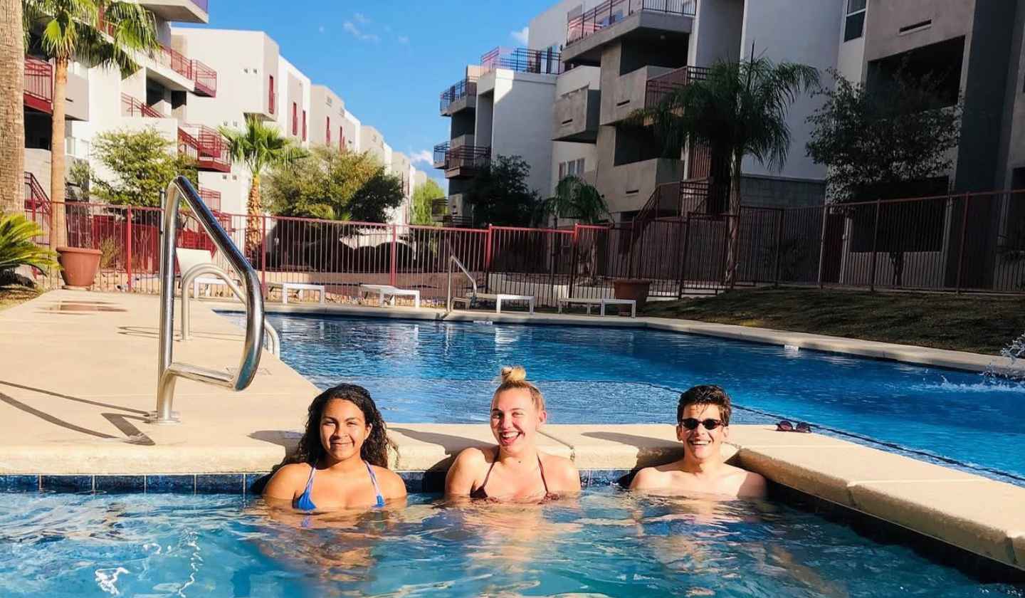 Three residents in the hot tub at The Seasons.