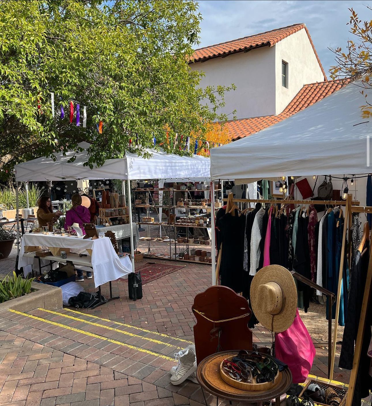 Shop for one of a kind gifts and local markets! Small businesses showcase handmade jewelry, art, and clothing for shoppers at the Mercado San Agustin.