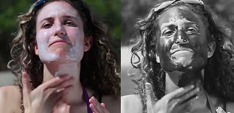 Woman applying sunscreen on her face — Aurora, CO — The Sun Bus Woman applying sunscreen on her face — Aurora, CO — The Sun Bus