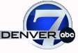 The denver 7 abc logo is a blue and white circle with a black circle in the middle.
