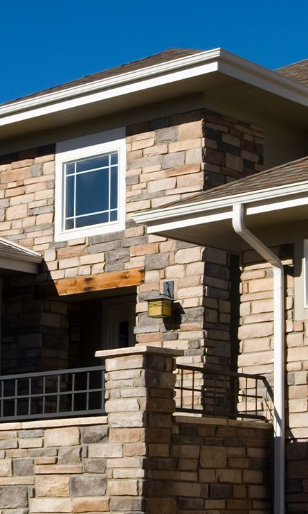 House Exterior With Installed Gutter Guards