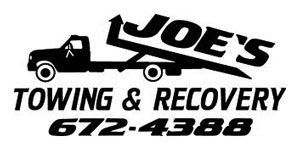 A black and white logo for joe 's towing and recovery.
