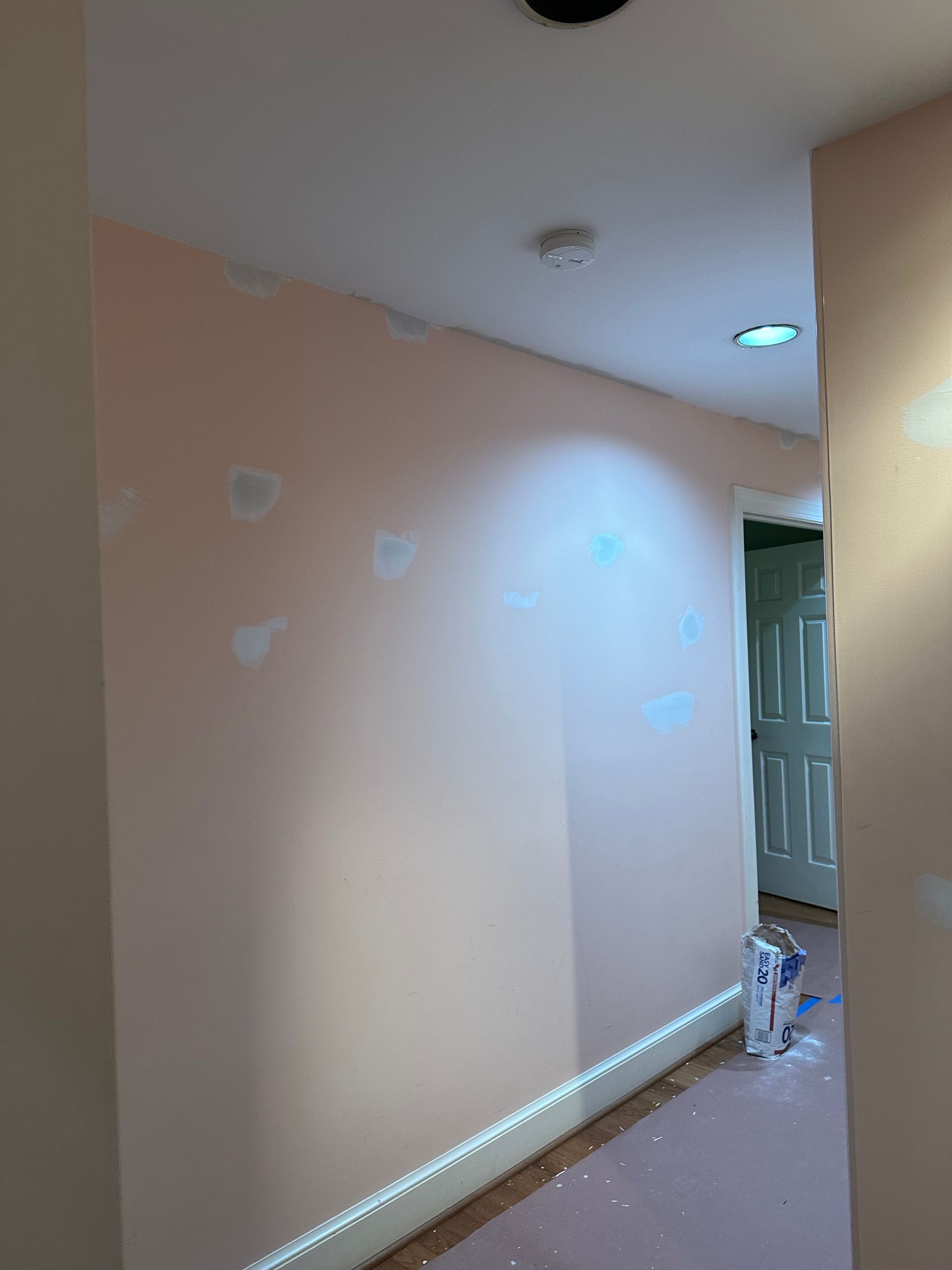 A hallway getting prepared for painting.