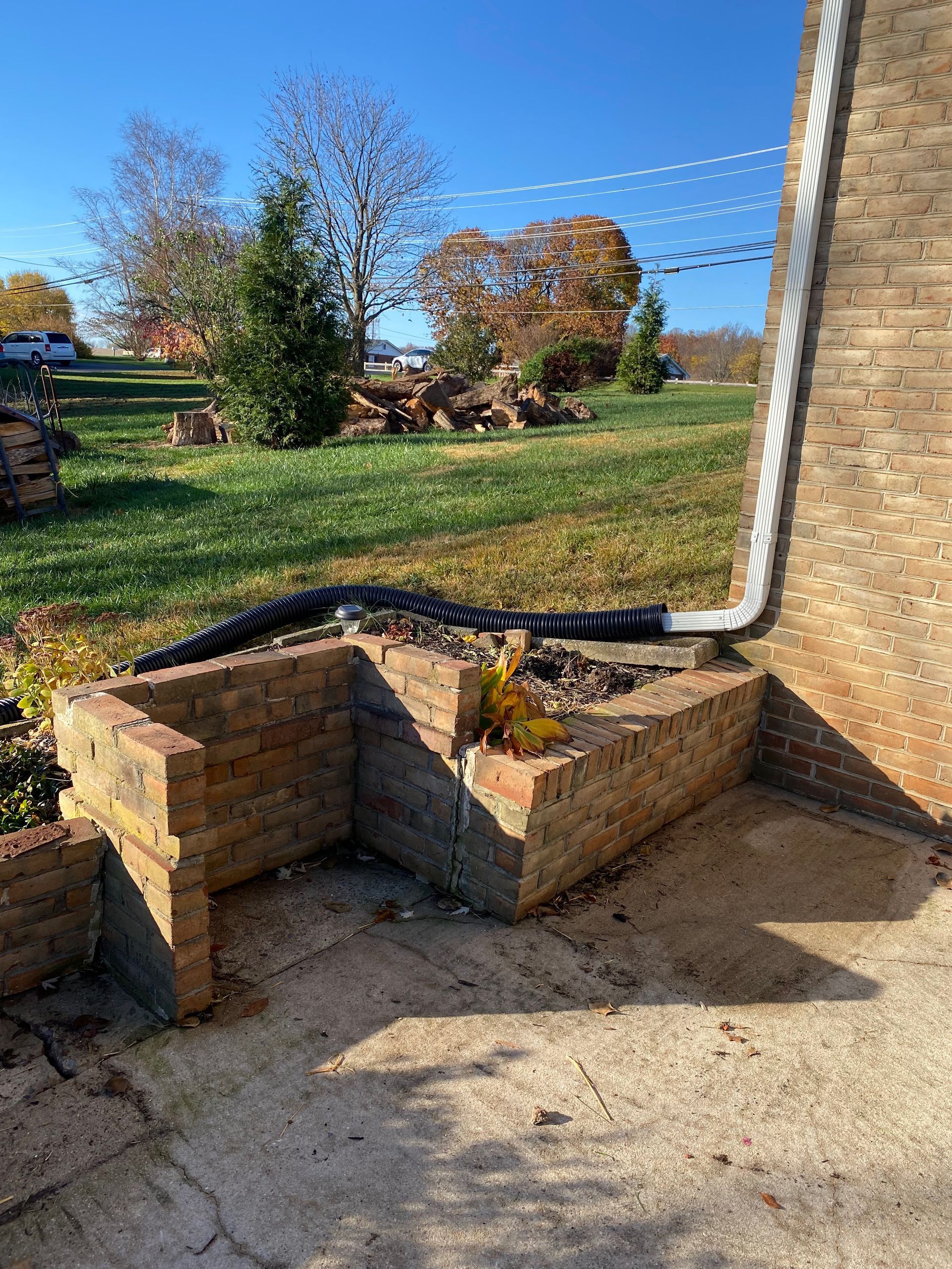 A brick retaining wall. under construction.