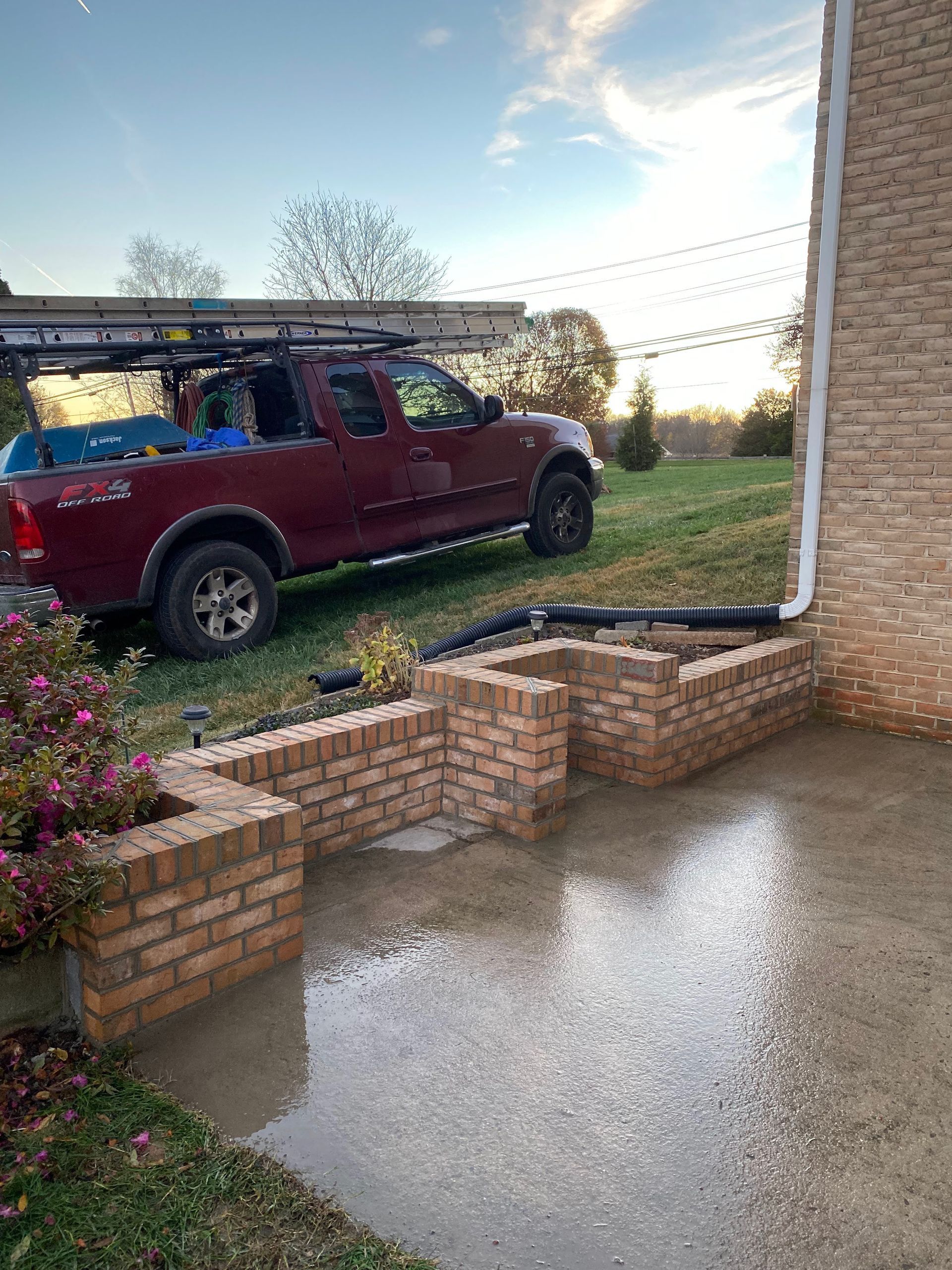 Completed retaining wall at end of patio.
