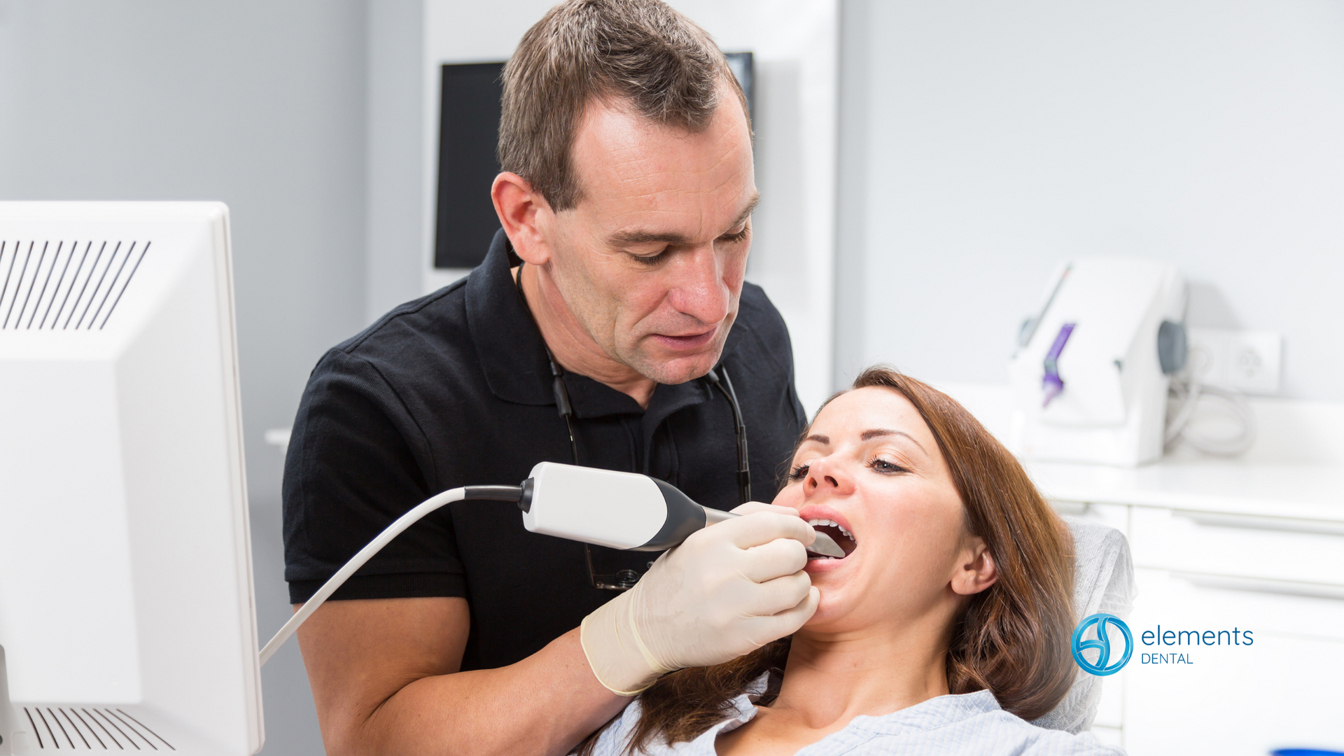 A dentist is examining a woman 's teeth in a dental office.